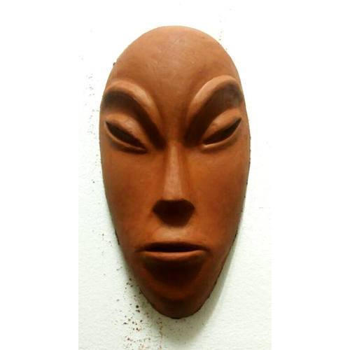 Masque en terre cuite